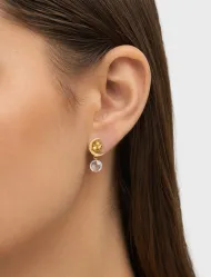 پیرسینگ گوش دخترانه نقره ای و طلایی روی مدل